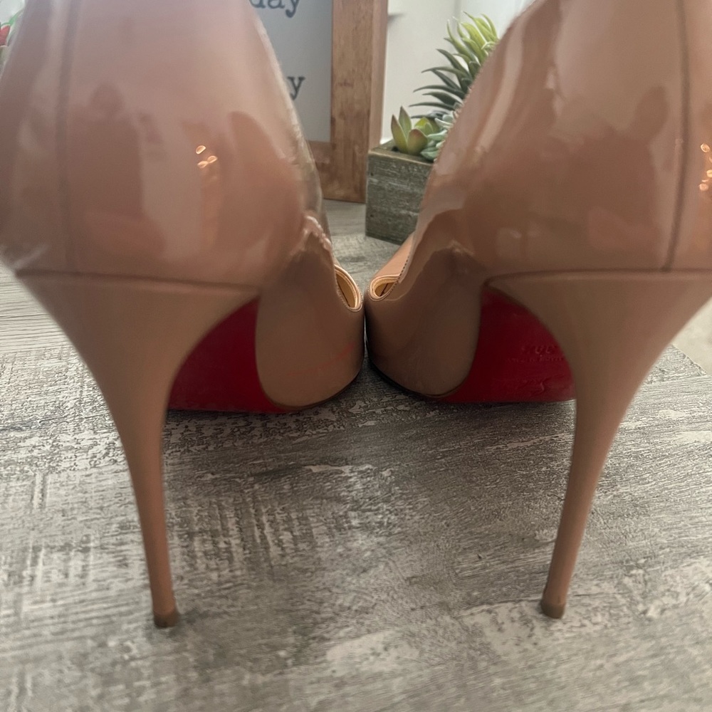 Gently worn Christian louboutin shoes.  Nude.